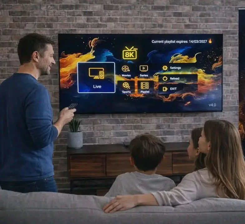 A family watching live TV through one of the best IPTV providers in the US on a wall-mounted 4K Smart TV